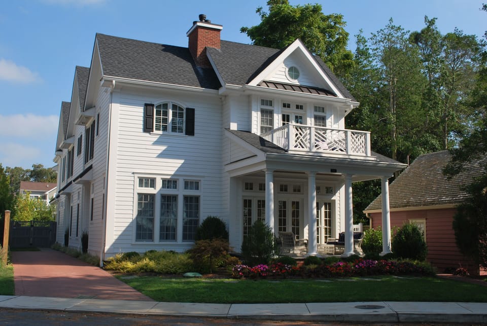 Designer's own unbelievable 9 BR, 10 BA lakefront residence only one block to the beach and boardwalk.  Front porch, balcony, living room and 2 master bedrooms all front Silver Lake.