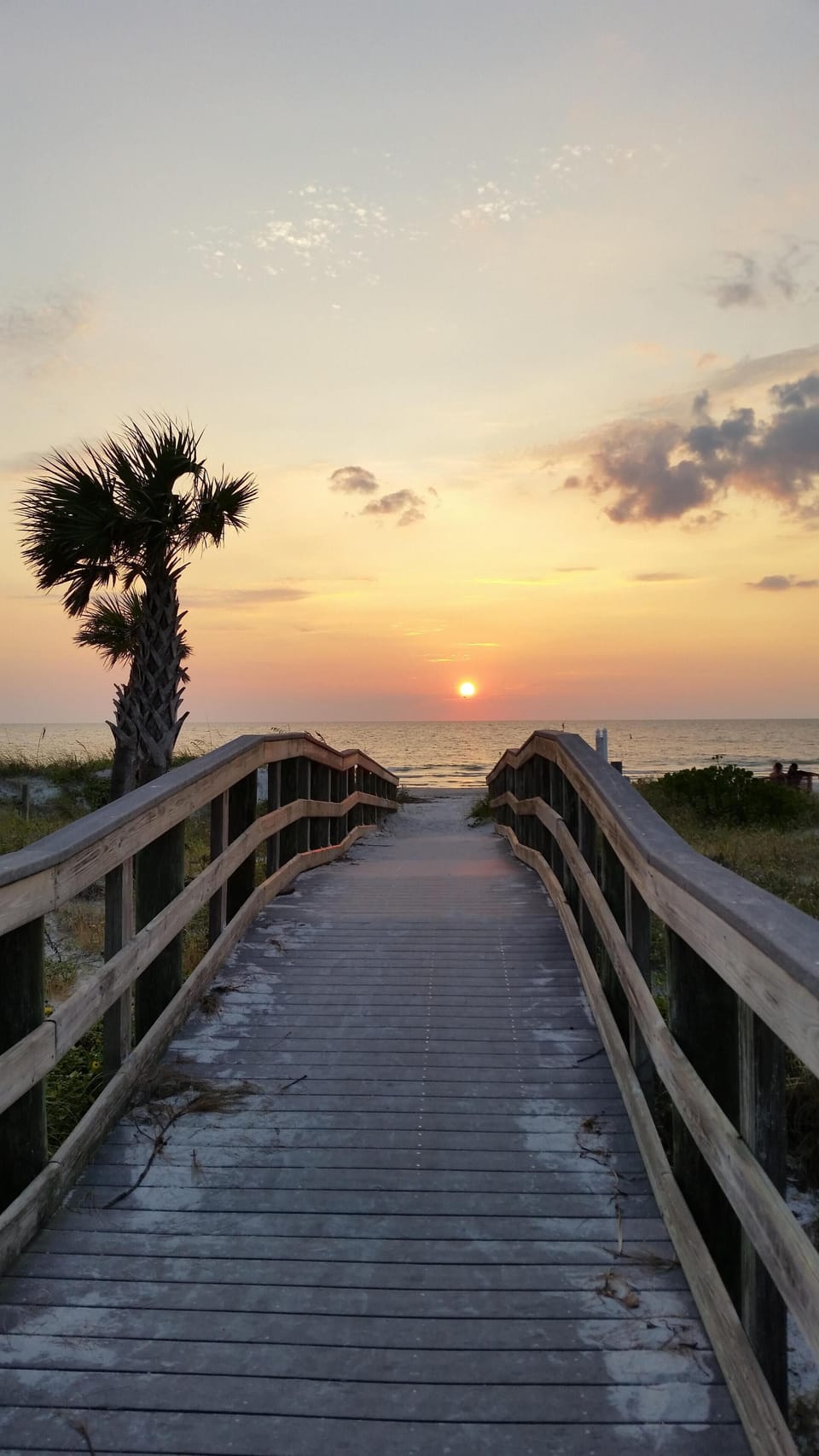View of 198th Avenue beach access, just steps from the condo, at sunset