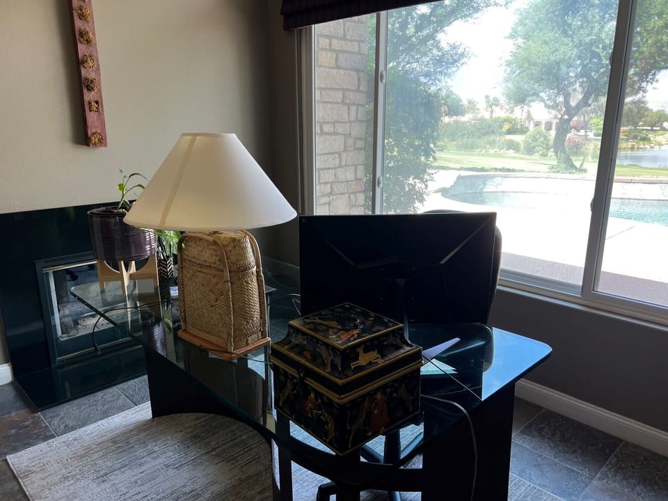 Office  with printer and gorgeous view of golf course and pool