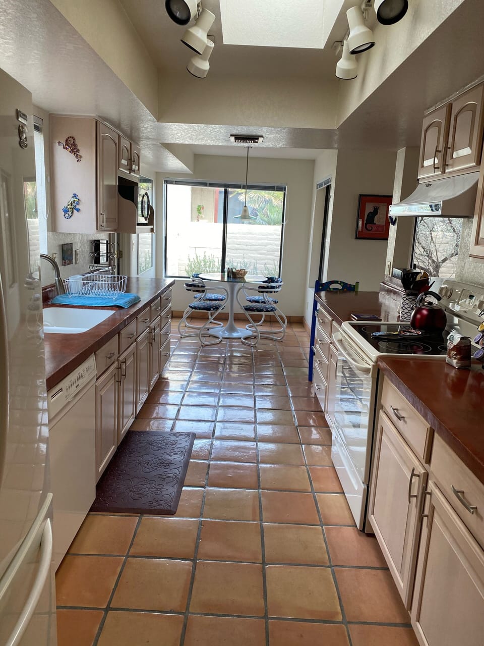 Modern lovely kitchen with eat in breakfast nook concrete counter tops