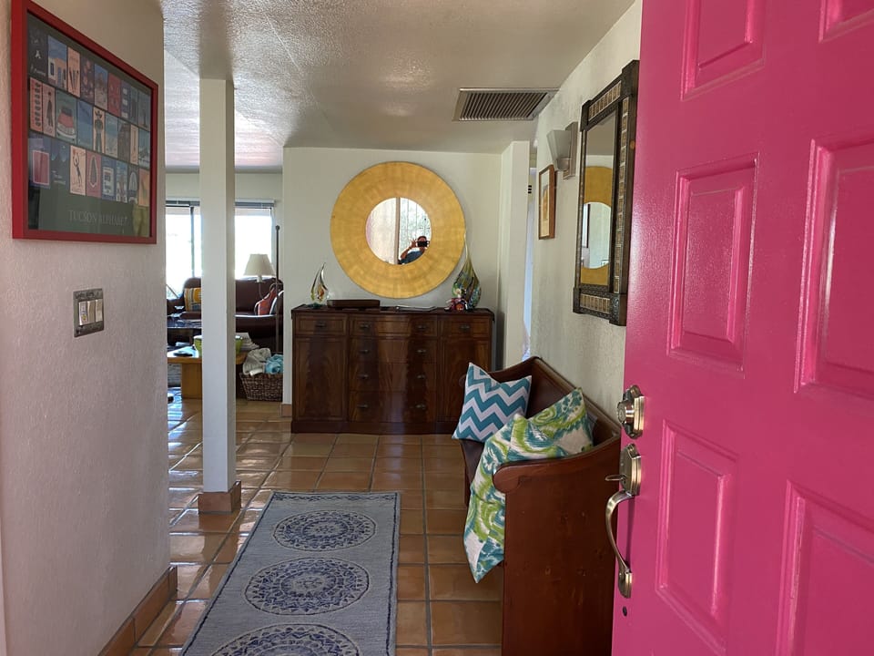 Front entrance leading towards living and dining room