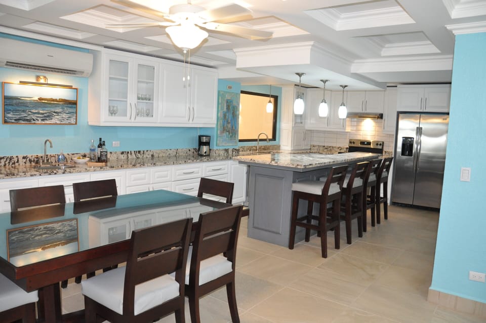 A full service kitchen with granite countertops and top notch appliances. 