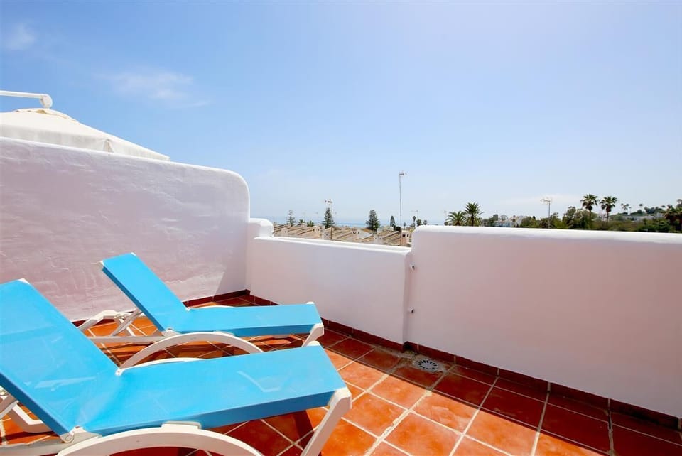 Two sunloungers available for guests on the terrace with sea views