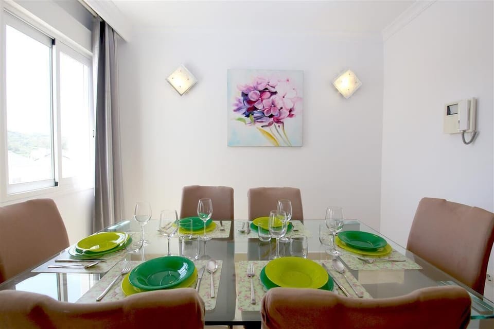 Modern dining area with seating for four guests