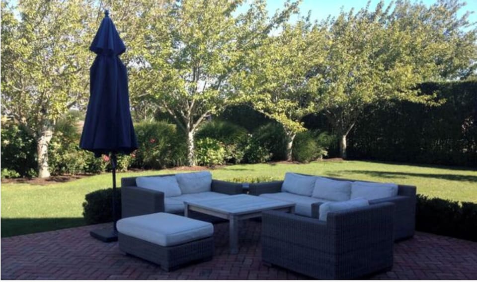 1 of 2 outdoor patios (trees no longer in existence)