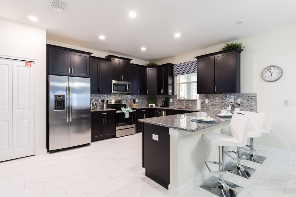 The retreat at championsgate at Davenport Florida resort vacation rental homes in orlando florida near universal studios with kitchen