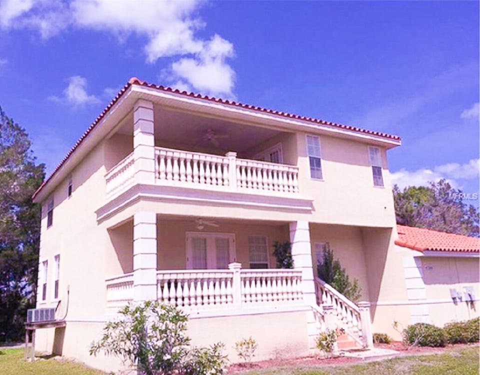 Side porches Now Both Screened - Rear entrance. House just across road from pool