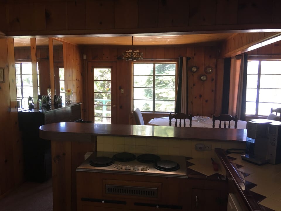 Kitchen with gas stove top.