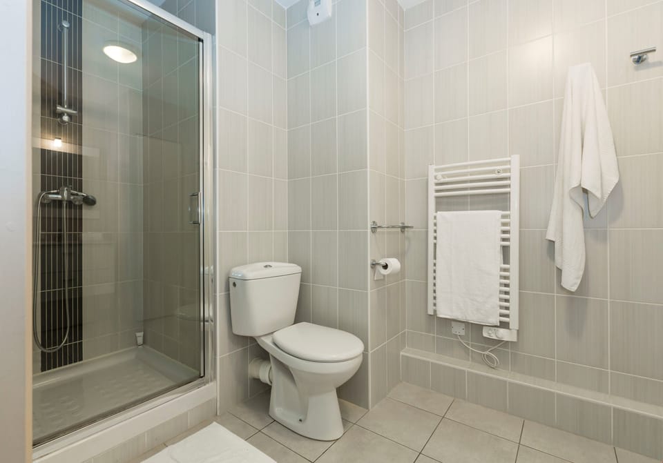 Get ready for your day in the lovely bathroom.