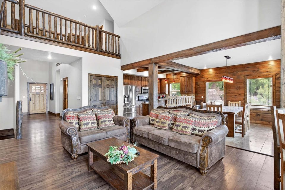 Open concept living area that flows into the kitchen and dining room