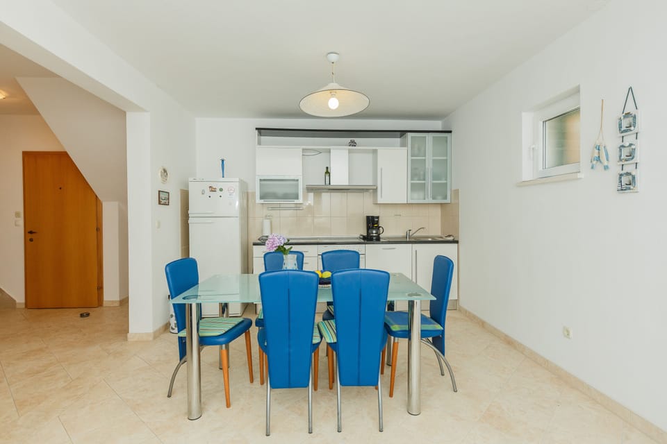 Additional kitchen and dinning area in the first floor right apartment