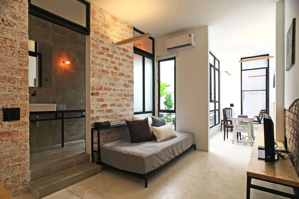Separate living room with sofa that can be converted to a proper bed