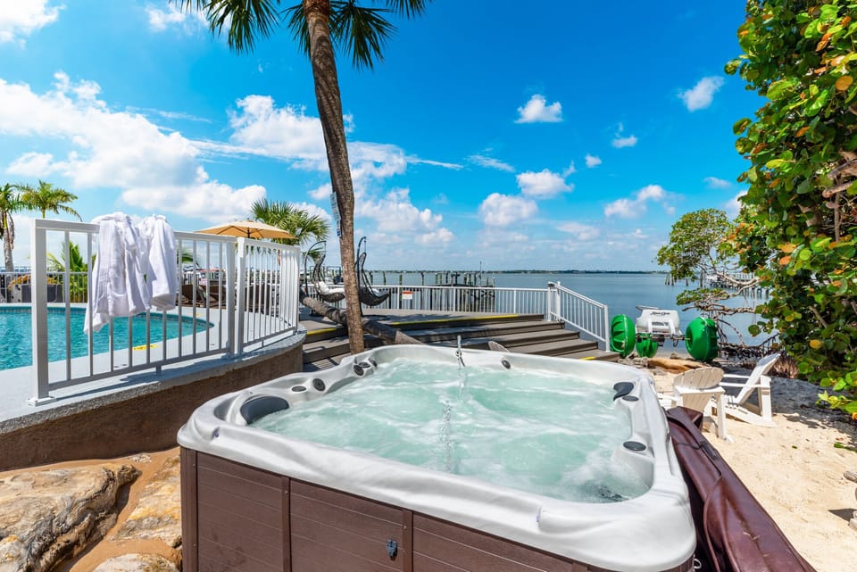 Riverside private pool and hot tub, complete with lounge deck.