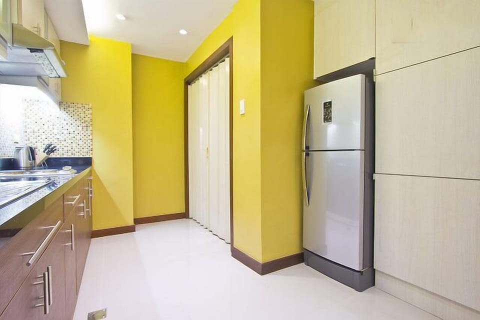 fridge and laundry area 