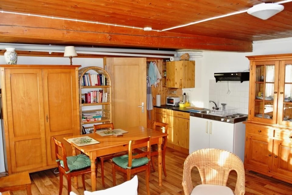 The dining and kitchen area.