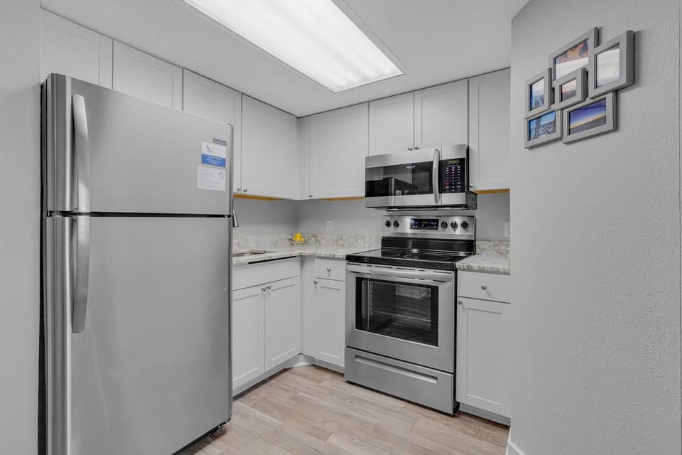 Gather the family for a delightful cooking experience in our suite's kitchen, a spacious and family-friendly setting perfect for creating lasting memories.