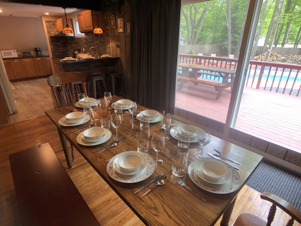 Dining table overlooking private swimming pool