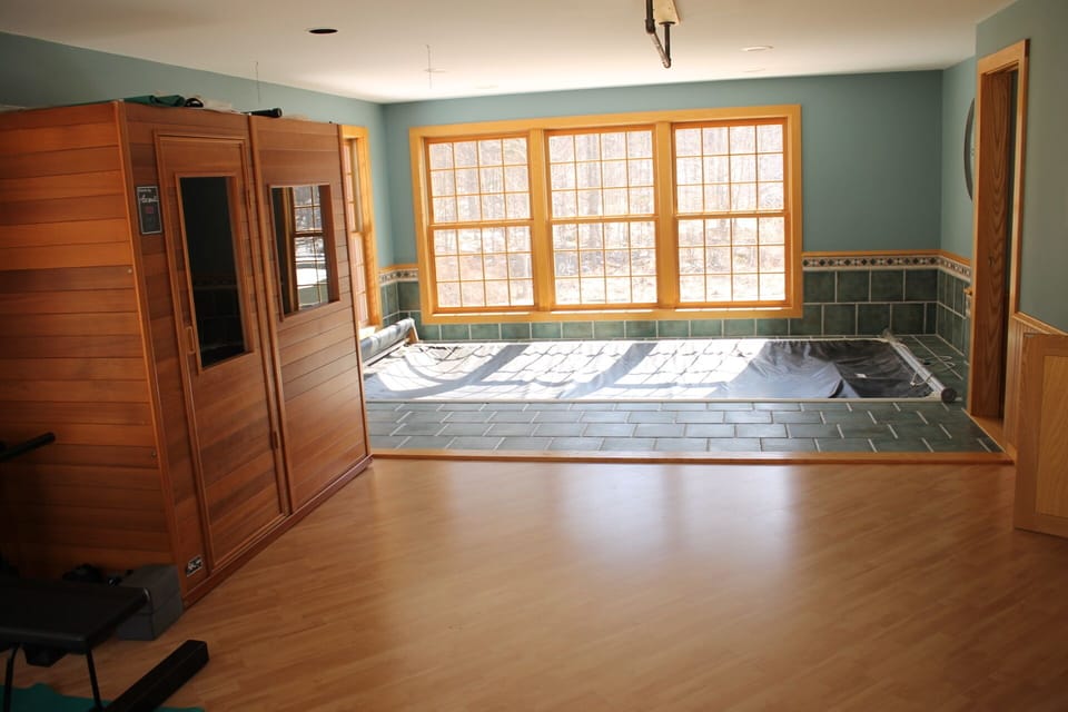 Exercise room with infra red sauna. Endless pool in photo is NOT OPERATIONAL