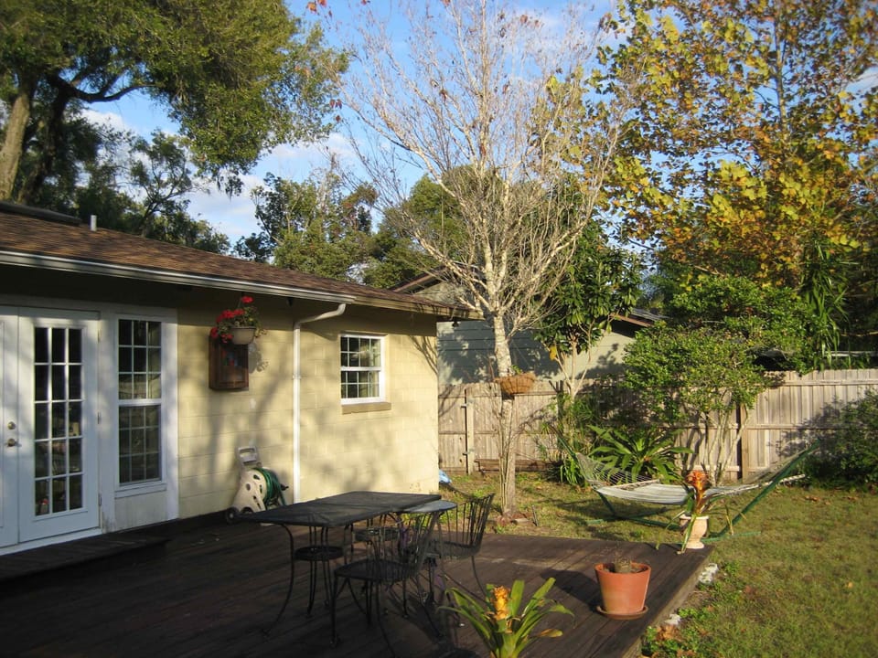 Back patio with dart board, bocce ball and croquet set. Lounge on the hammock.