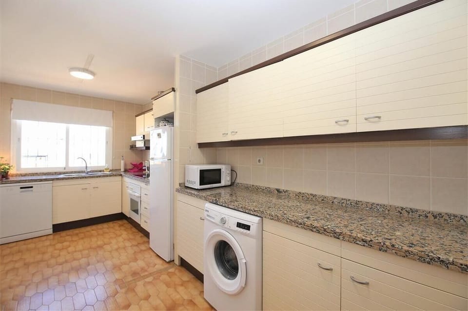 Another view of the fully equipped kitchen