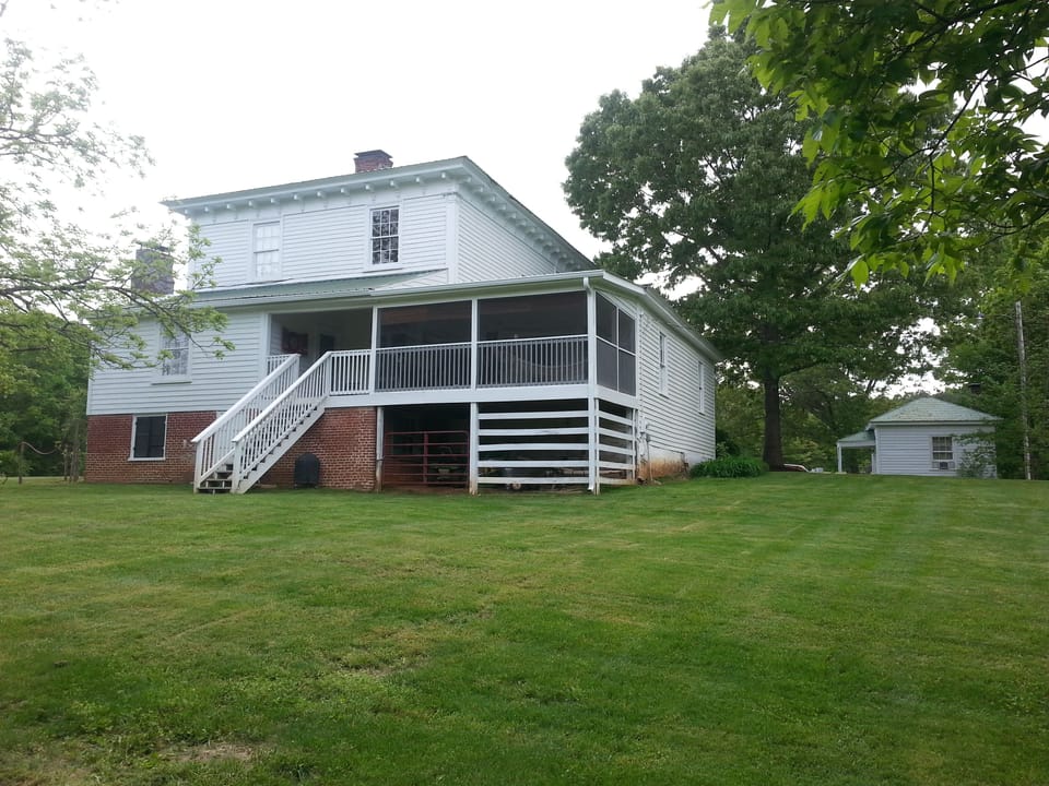 Back of the house with screened porch.
