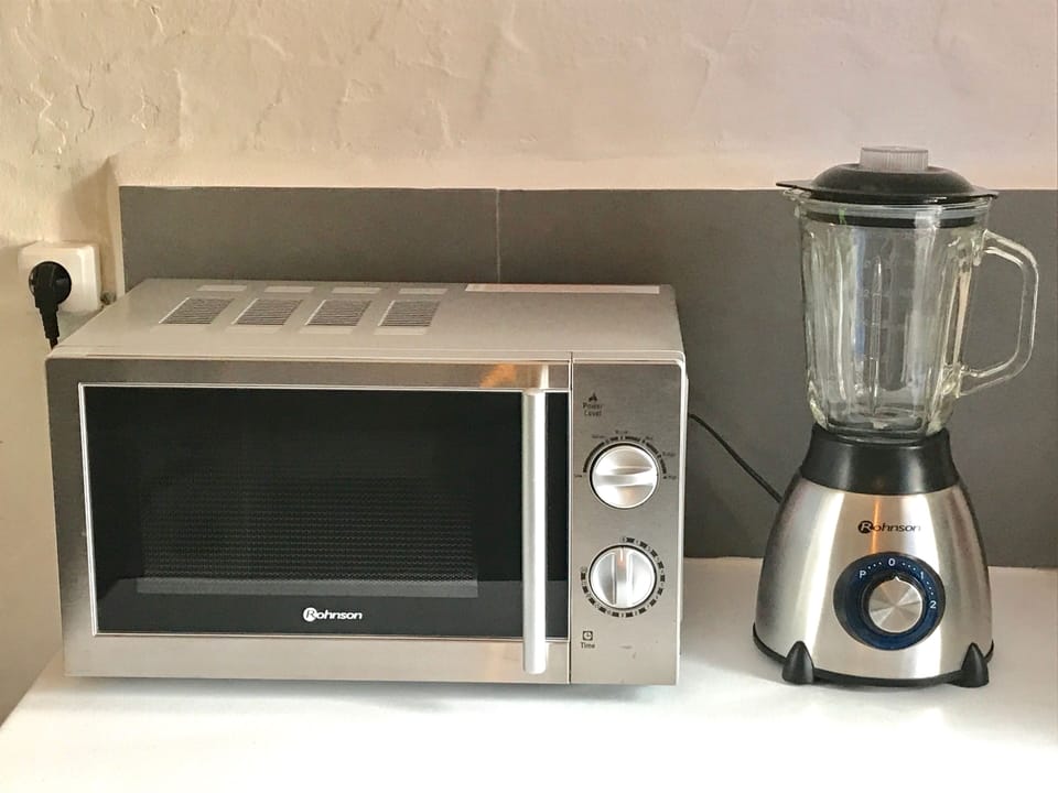 New stainless steel microwave and blender.