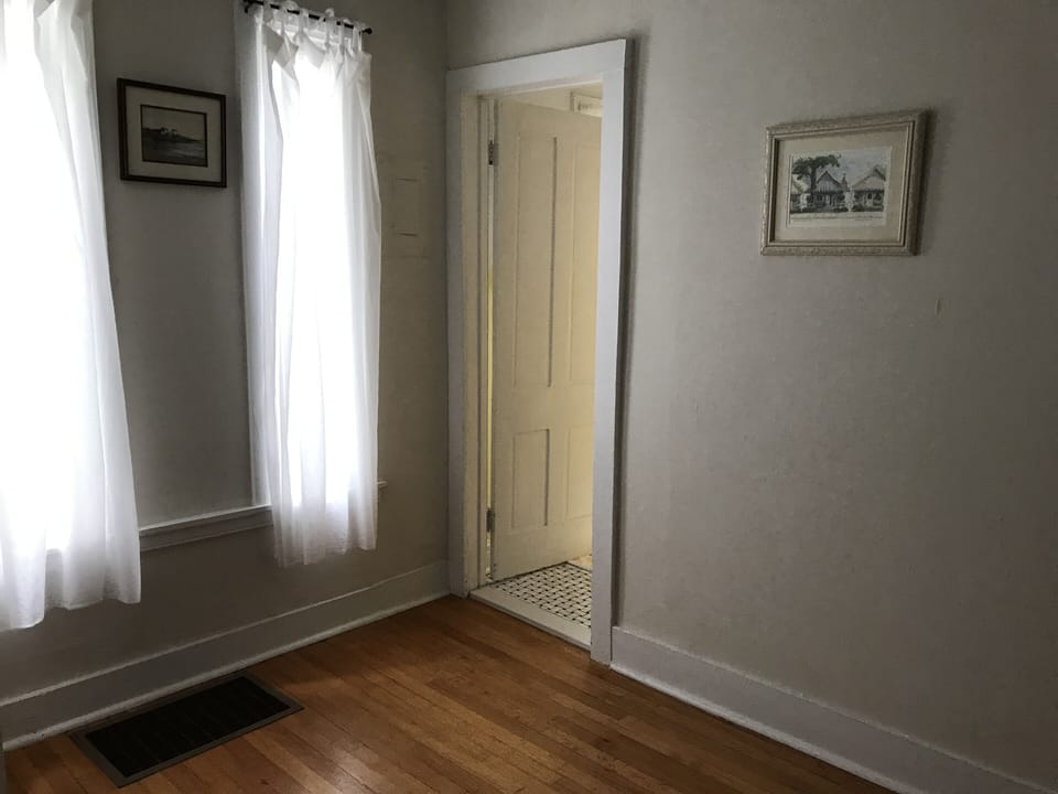 Dining room is adjacent to kitchen, bath, and bedroom 