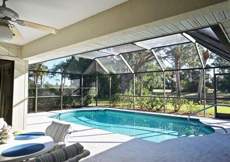 Covered Portion of Pool deck with patio furniture