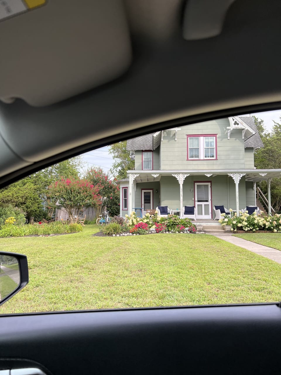 You've arrived!  Park on the street and walk around the right side of the house
