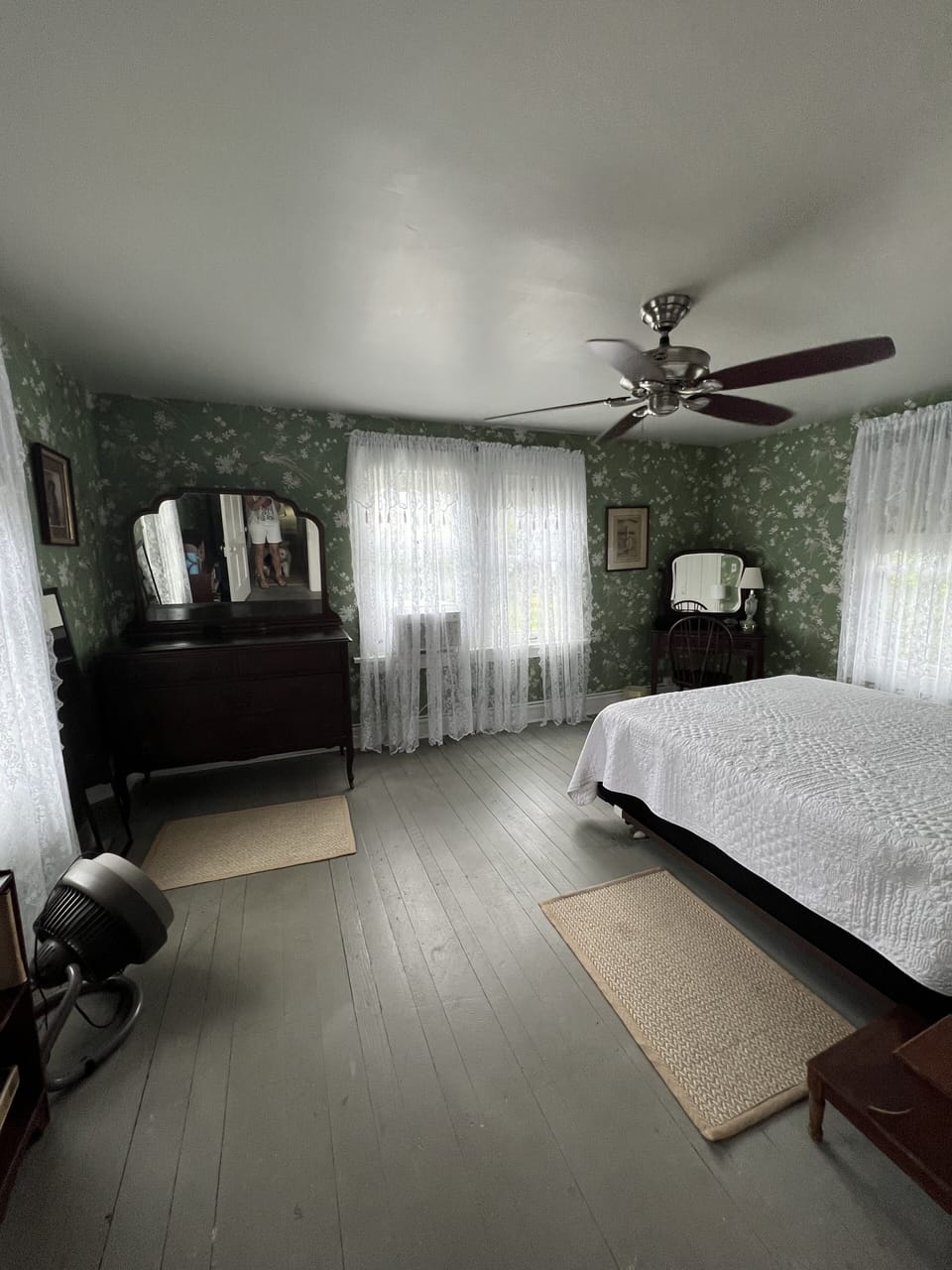 Enter Primary Bedroom. Cool breezes flow thru each night
