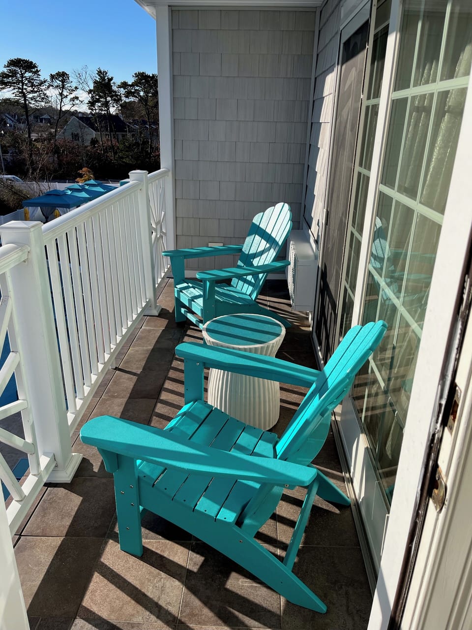 Private outdoor deck, outside of living room. Relax with a drink or book.