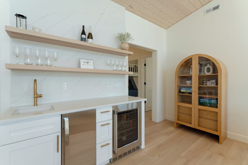 Bar with nugget ice maker and beverage refrigerator