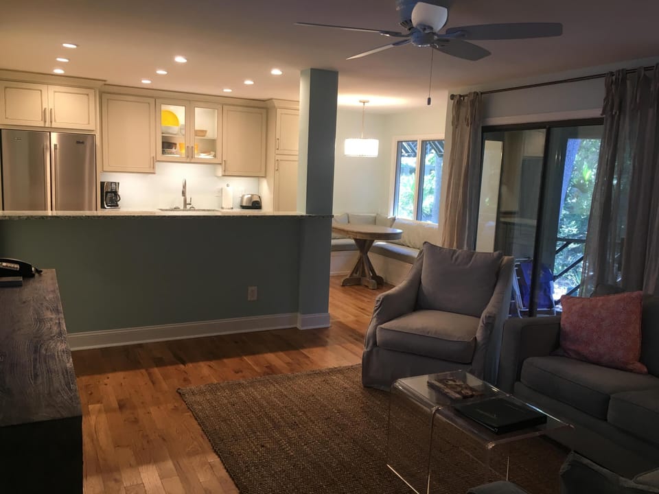 View from Living room, into kitchen and dining area