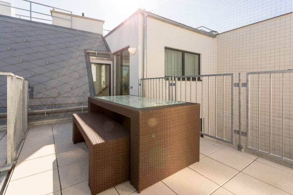 Private Terrace via upper floor