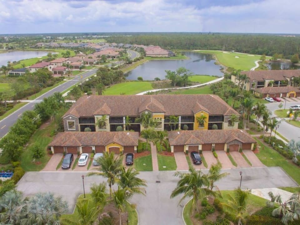 Aerial view of this neighborhood with 11th hole in the background. 