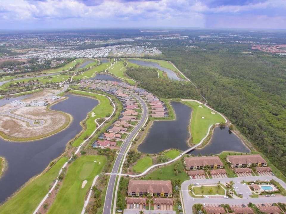 Unit is the third building on the right,  first floor with view of water & golf