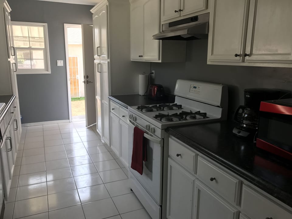 Fully stocked galley kitchen.