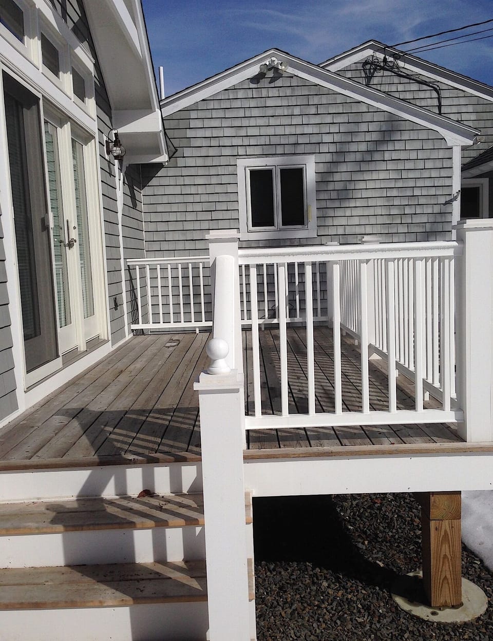 Stairs to deck; entrance to suite is off deck.