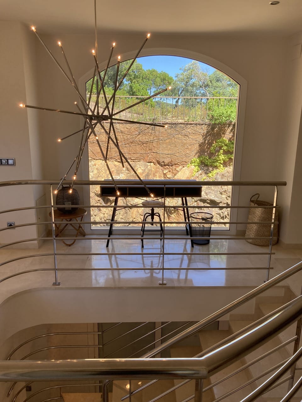 Staircase from bedrooms to upstairs living-room and kitchen