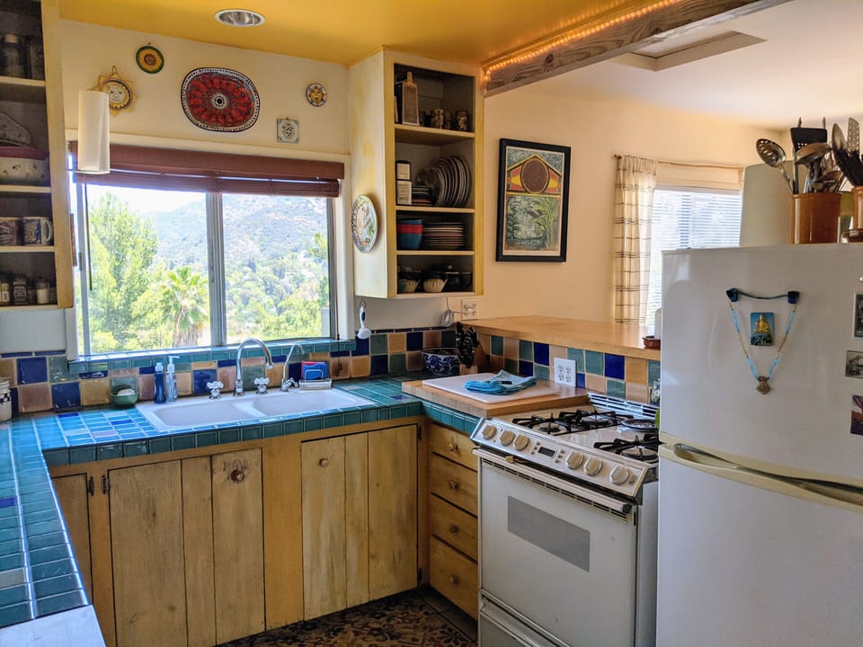 Kitchen with great meal prep tools and utensils.