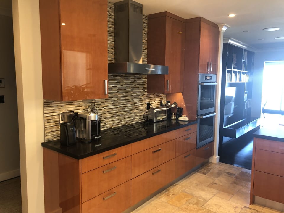 Kitchen with Miele induction cooktop and double oven.
