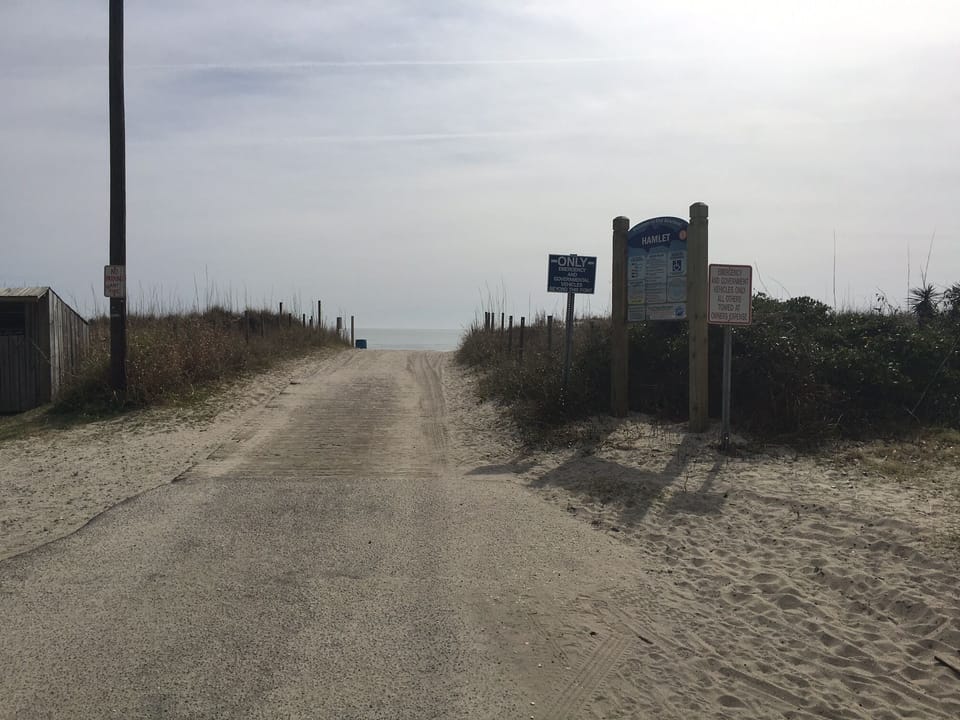 Beach access directly across the street with parking and restrooms