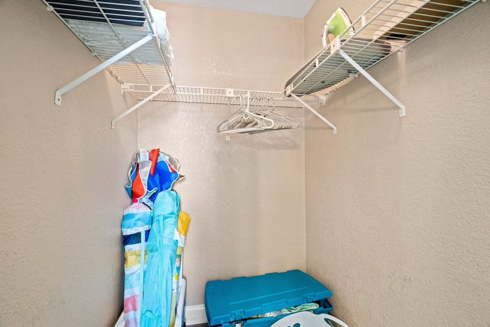 Closet space with iron and hangers for your clothes.