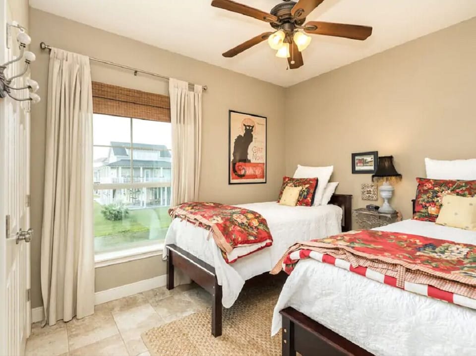 3rd bedroom, luxury twin beds. Faces north overlooking water canal