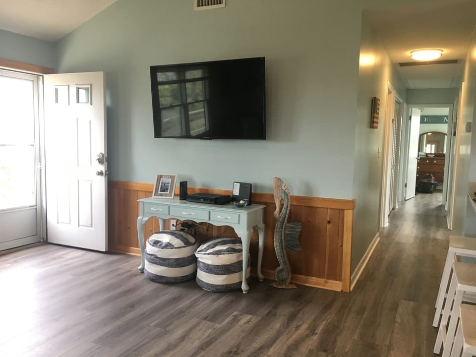Living room area with view down hall
