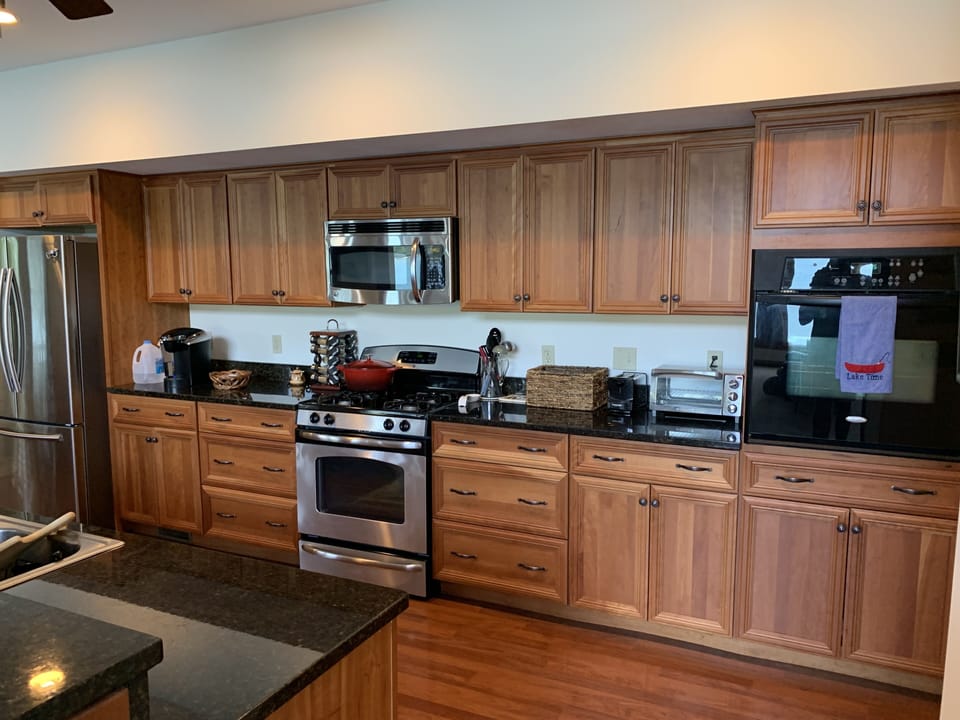 Kitchen with Two Ovens, a Dishwasher, a Toaster Oven, Microwave, Fridge/Freezer