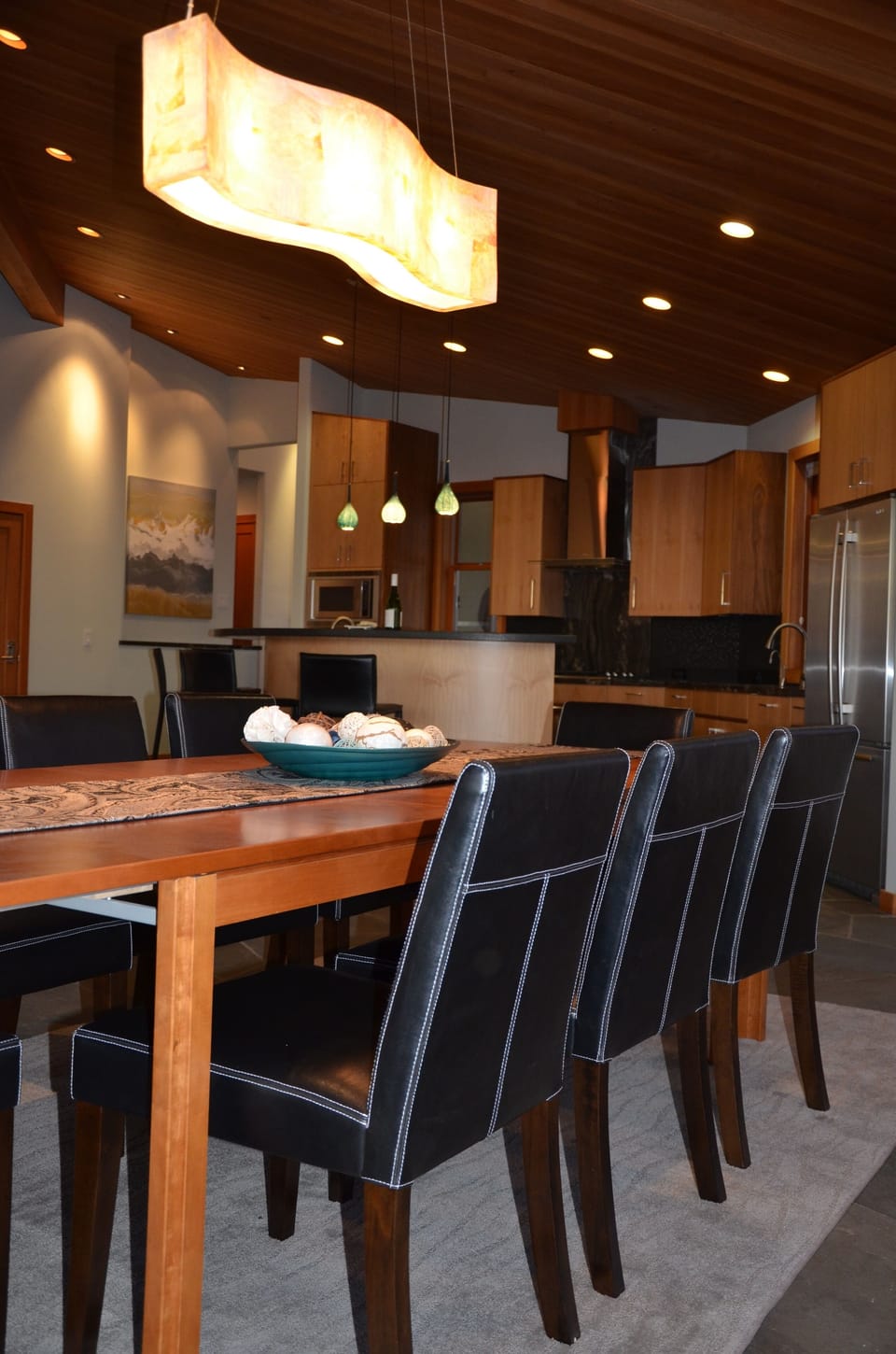 Custom light fixtures add elegance and ambiance