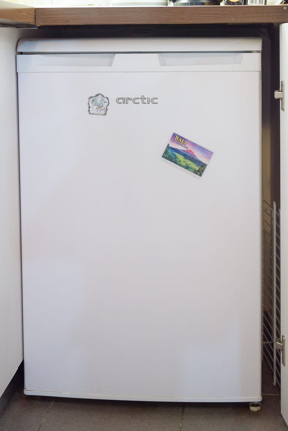 Under top fridge