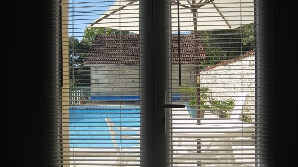 Bedroom view of the pool
