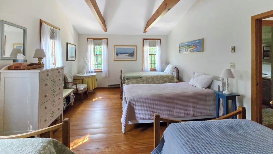 Second floor bedroom with four twin beds